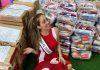Concurso de beleza promove ação social A influenciadora, modelo e atriz Thata Perrony foi a vencedora do concurso por ter arrecadado 1 tonelada e meia de alimentos. Foto: Arquivo pessoal/Thata Perrony